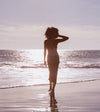 woman walking on a beach