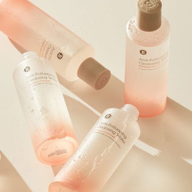 Multiple bottles of Blithe Anti-Polluaging Cleansing Water with Himalayan Pink Salt, featuring a soothing and hydrating cleansing formula, perfect for sensitive skin.