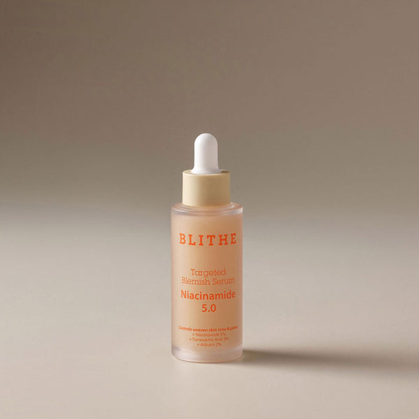 Targeted Blemish Serum on a beige surface